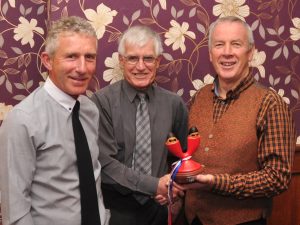 Ali Banks, Derek Lusher and John Swanbury with the 10-mile tandem double egg cup trophy